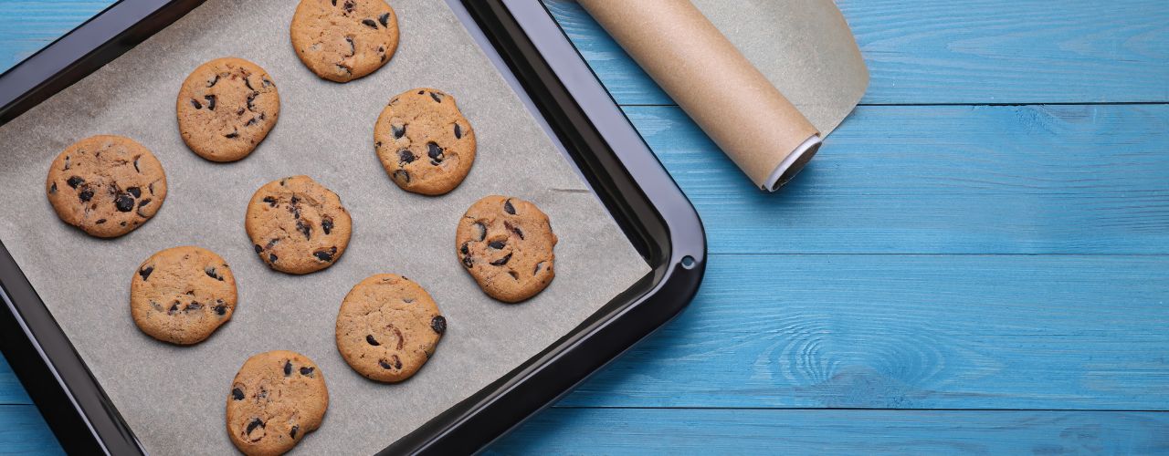 Cookies on parchment paper on a baking tray