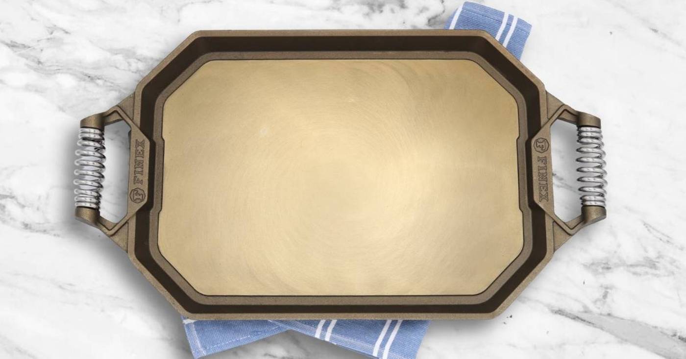 An overhead view of the FINEX 18 inch double burner cast iron griddle
