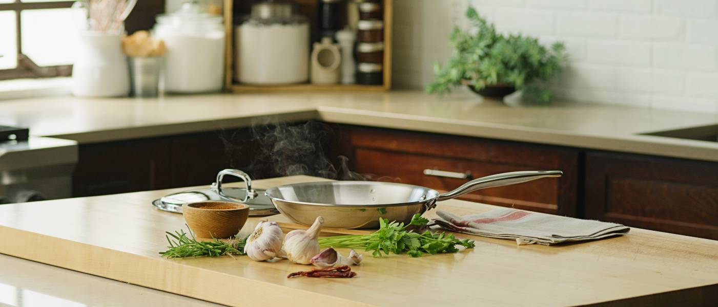 Heritage Steel 316ti Stainless Steel Frying Pan on a kitchen counter 