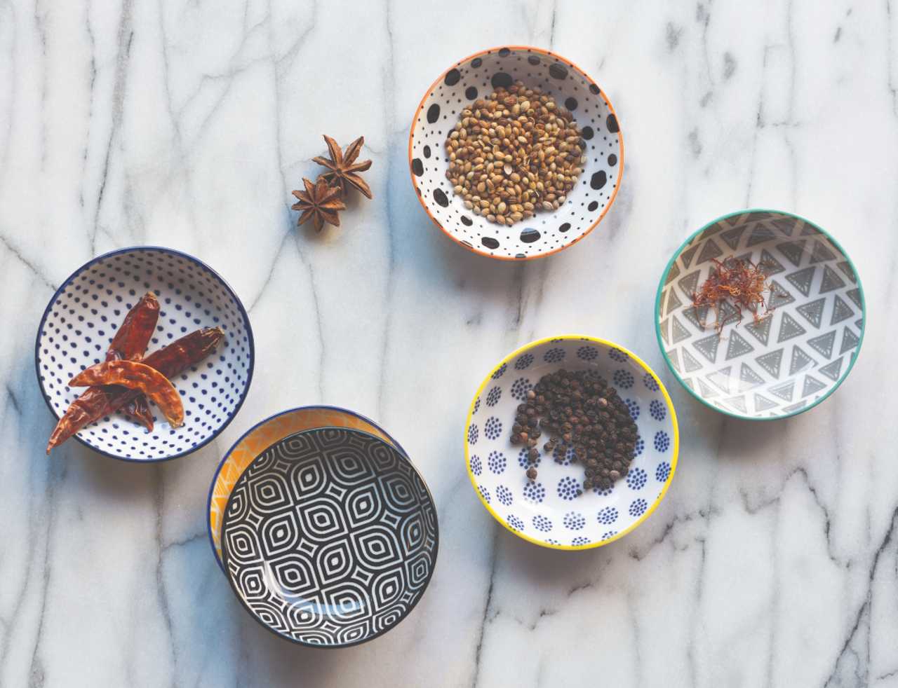 The Now Designs Bits and Dots pinch bowls with seed and peppers