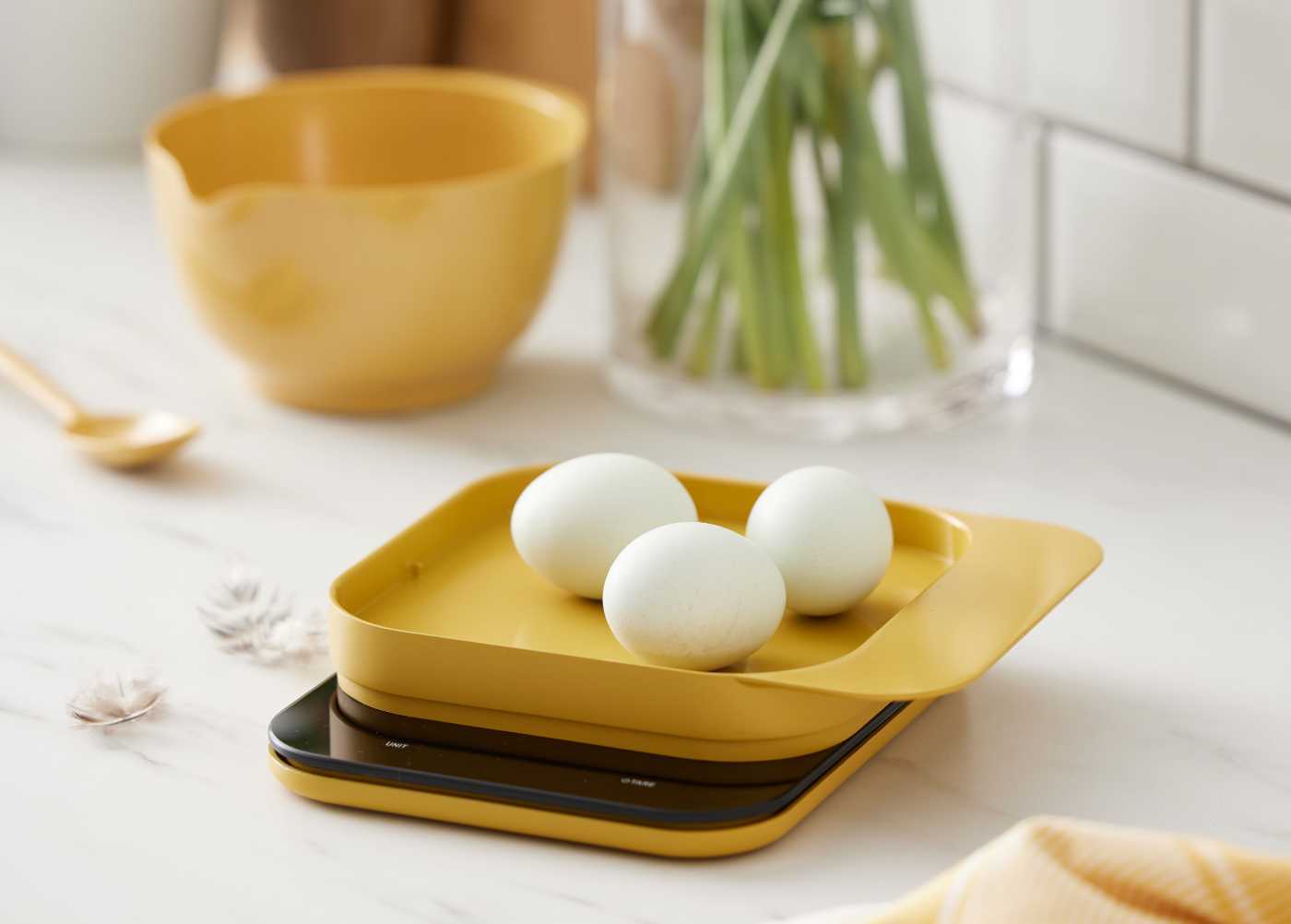 The Rosti Mensura digital kitchen scale weighing eggs