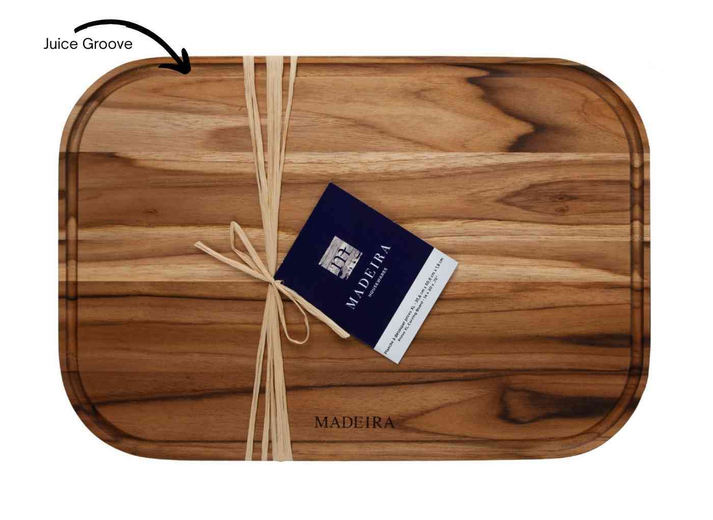 A teak cutting board with a juice groove